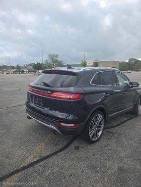 Blue 2015 Lincoln MKC Base
