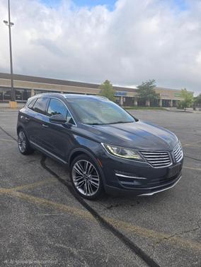 Blue 2015 Lincoln MKC Base