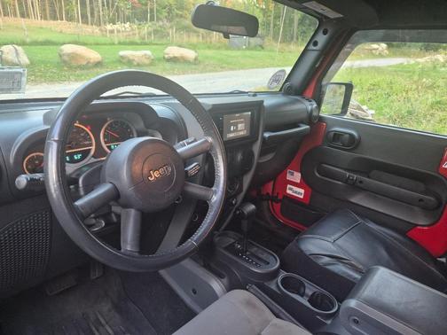 Red 2010 Jeep Wrangler Sport