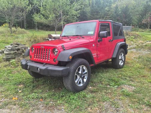 Red 2010 Jeep Wrangler Sport