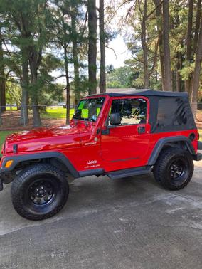 Red 2004 Jeep Wrangler Sport