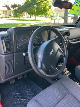 Red 2004 Jeep Wrangler Sport