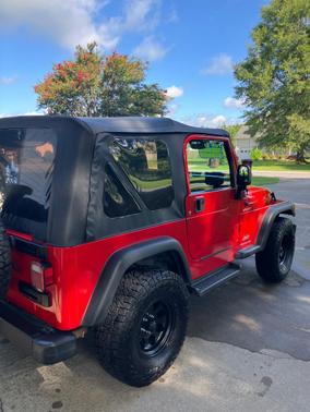 Red 2004 Jeep Wrangler Sport