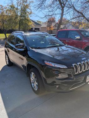 Black 2014 Jeep Cherokee Sport