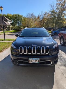 Black 2014 Jeep Cherokee Sport