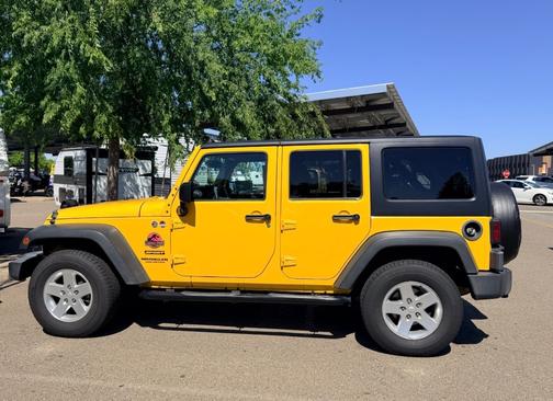 Yellow 2015 Jeep Wrangler Unlimited Sport