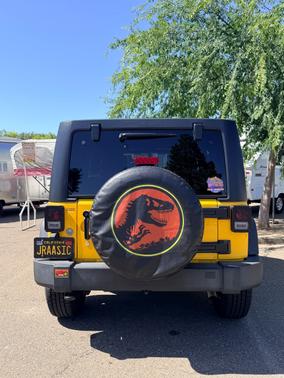 Yellow 2015 Jeep Wrangler Unlimited Sport
