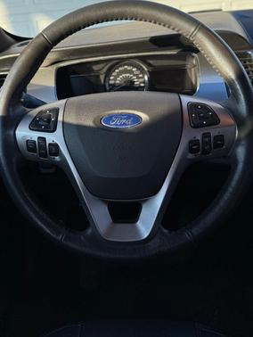 Black 2014 Ford Taurus SEL