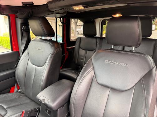 Red 2016 Jeep Wrangler Unlimited Sahara