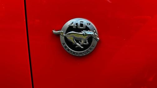 Orange 2004 Ford Mustang Mach I