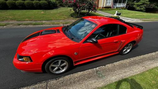Orange 2004 Ford Mustang Mach I