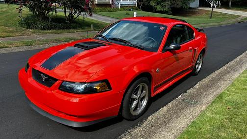 Orange 2004 Ford Mustang Mach I