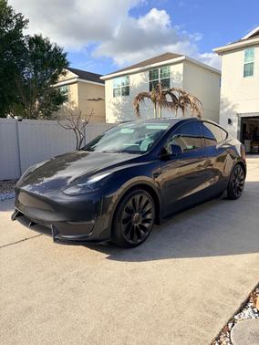 Gray 2024 Tesla Model Y Performance
