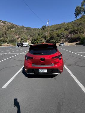 Red 2025 Toyota Corolla Hatchback XSE