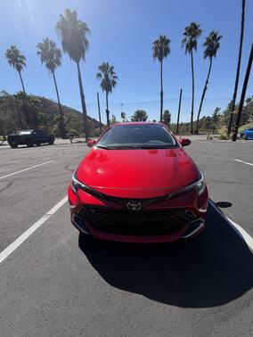 Red 2025 Toyota Corolla Hatchback XSE