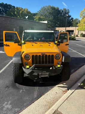 Yellow 2012 Jeep Wrangler Sport