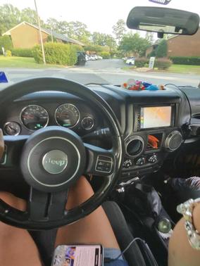 Yellow 2012 Jeep Wrangler Sport