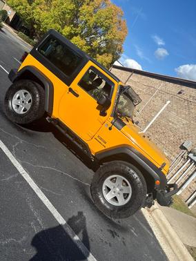 Yellow 2012 Jeep Wrangler Sport