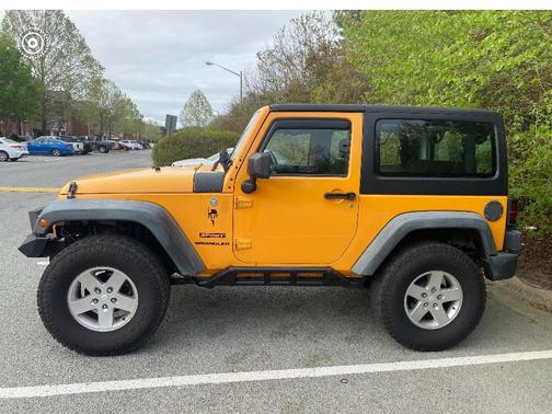 Yellow 2012 Jeep Wrangler Sport