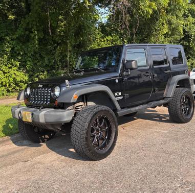 Black 2009 Jeep Wrangler Unlimited X
