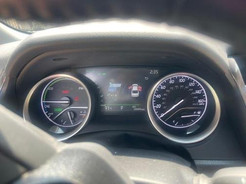 White 2023 Toyota Camry Hybrid XLE