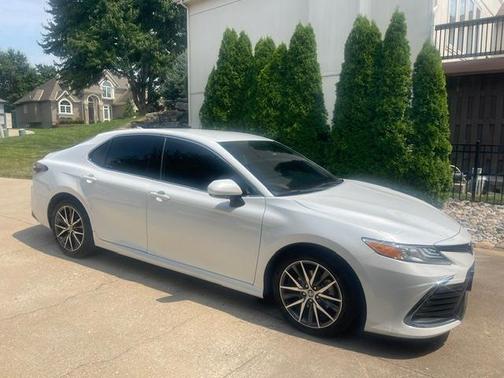 White 2023 Toyota Camry Hybrid XLE