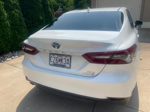 White 2023 Toyota Camry Hybrid XLE