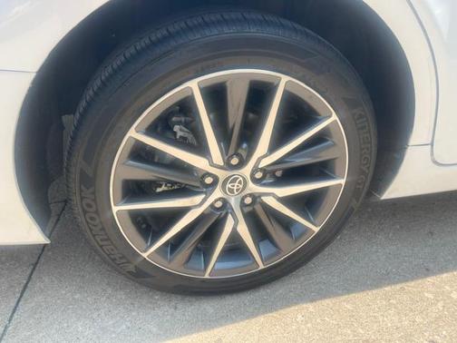 White 2023 Toyota Camry Hybrid XLE