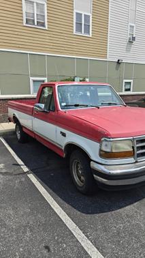 Red 1995 Ford F-150 XL