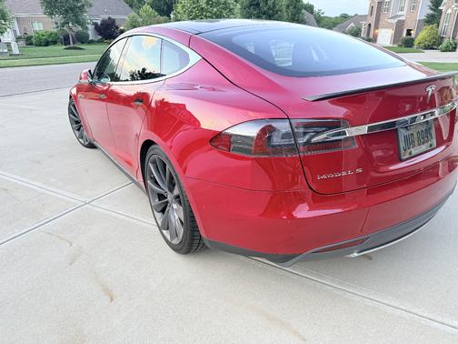 Red 2015 Tesla Model S P90D