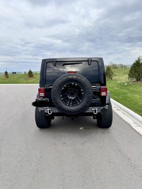 Black 2015 Jeep Wrangler Unlimited Sahara