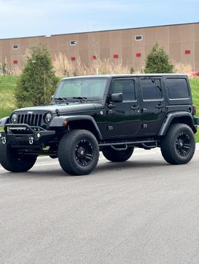 Black 2015 Jeep Wrangler Unlimited Sahara