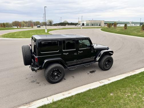 Black 2015 Jeep Wrangler Unlimited Sahara