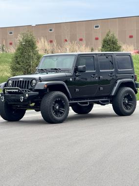 Black 2015 Jeep Wrangler Unlimited Sahara