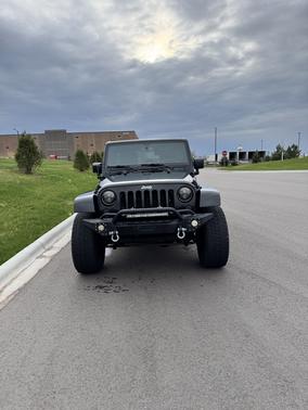 Black 2015 Jeep Wrangler Unlimited Sahara