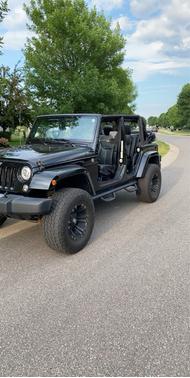 Black 2015 Jeep Wrangler Unlimited Sahara