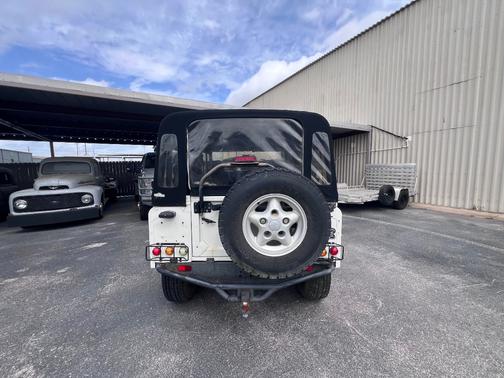 White 1997 Land Rover Defender 90 Soft Top