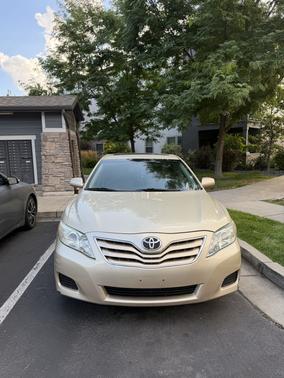 Gold 2010 Toyota Camry LE