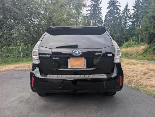 Black 2014 Toyota Prius v Three