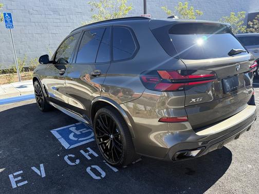 Green 2024 BMW X5 sDrive40i