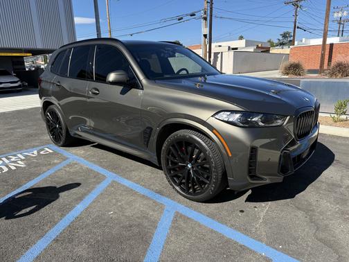 Green 2024 BMW X5 sDrive40i