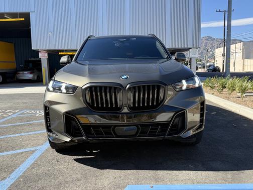 Green 2024 BMW X5 sDrive40i