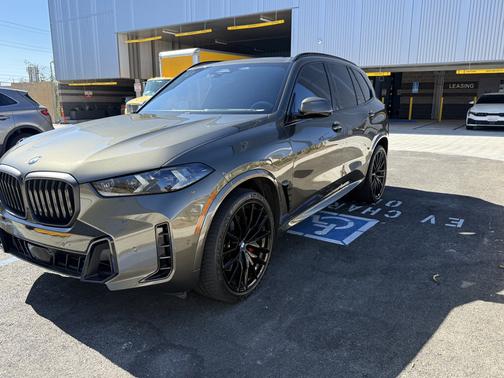 Green 2024 BMW X5 sDrive40i