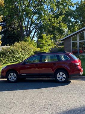 Red 2011 Subaru Outback 2.5i