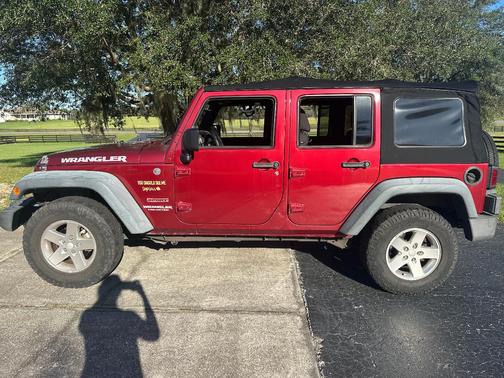 Red 2013 Jeep Wrangler Unlimited Sport