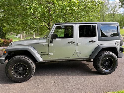 Silver 2013 Jeep Wrangler Unlimited Sport