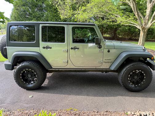 Silver 2013 Jeep Wrangler Unlimited Sport