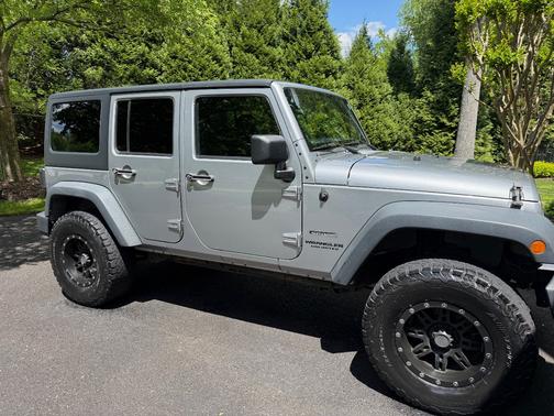 Silver 2013 Jeep Wrangler Unlimited Sport