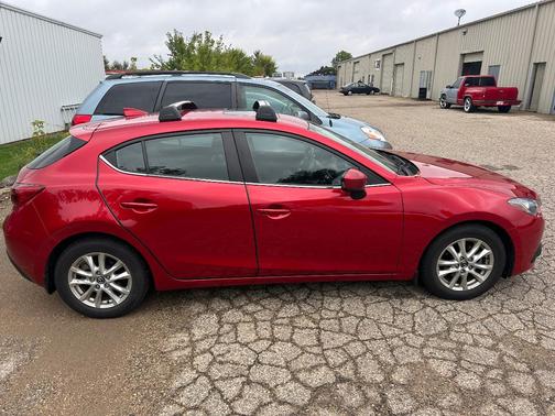 Red 2016 Mazda Mazda3 i Grand Touring
