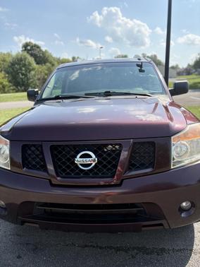 Red 2015 Nissan Armada SV